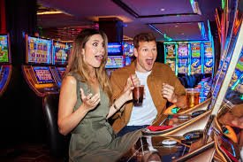 man and woman gambling at a casino